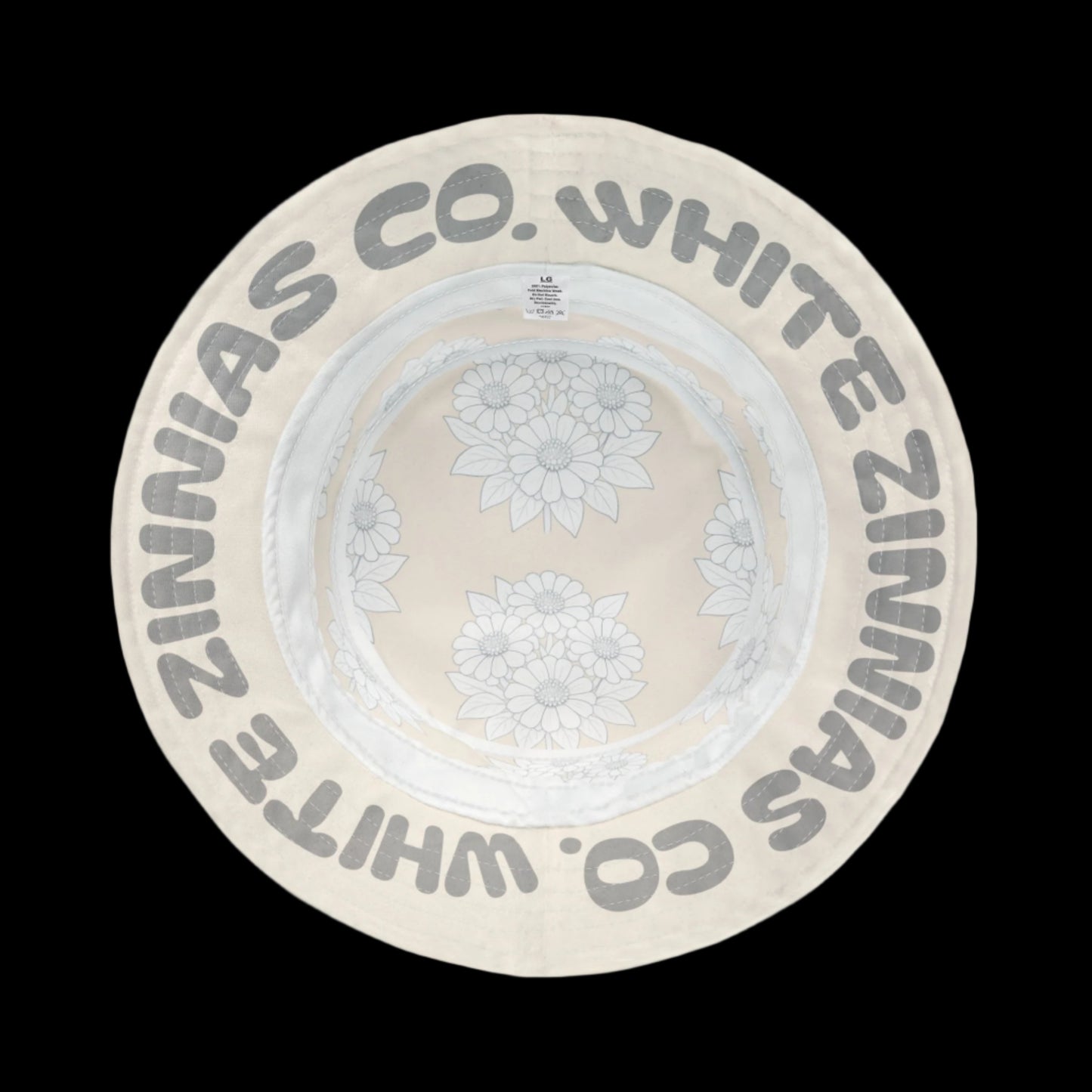 White Zinnias Co. sun hat with floral design on a white background