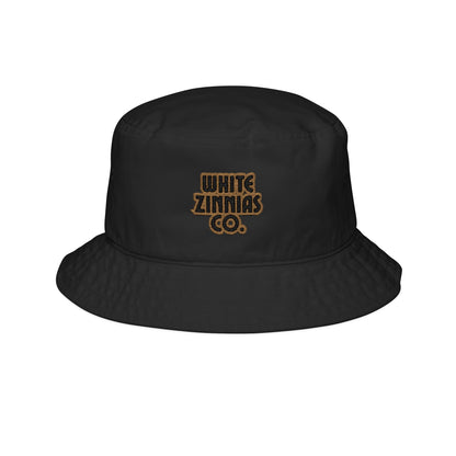 Black bucket hat with 'White Zinnias Co.' logo on a white background