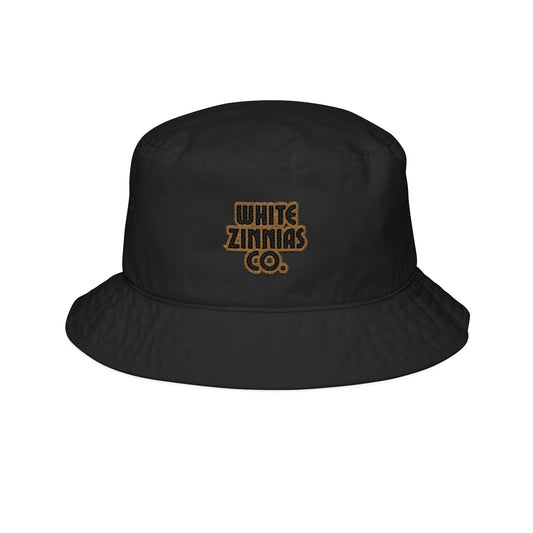 Black bucket hat with 'White Zinnias Co.' logo on a white background
